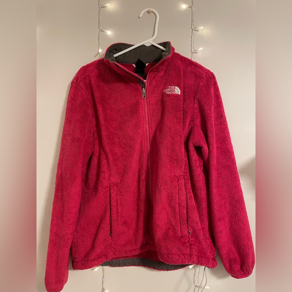 hot pink North Face fluffy jacket